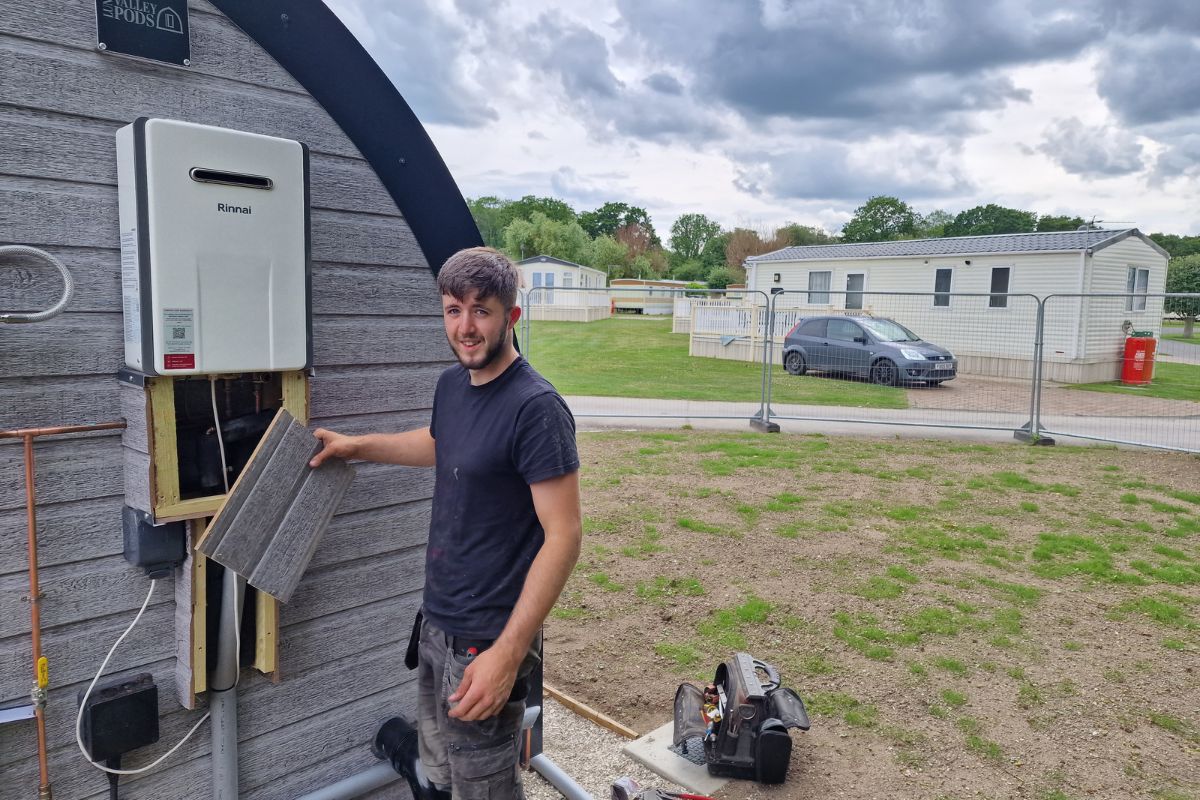 Sparta heating and care team working at a caravan